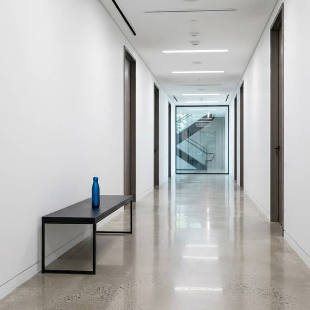 Minimalist office interior with a blue water bottle
