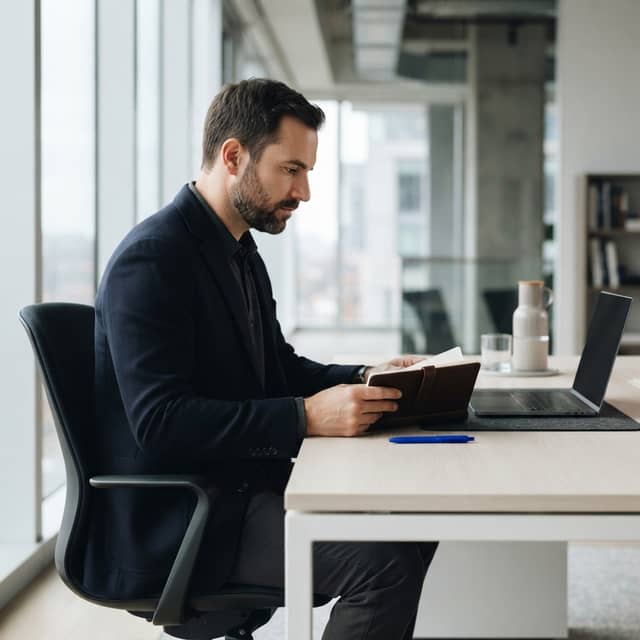 Professional SaaS leader contemplating business strategy