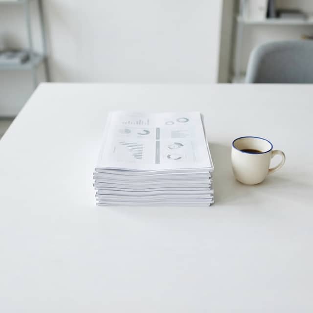 Professional strategy documents on a clean white desk